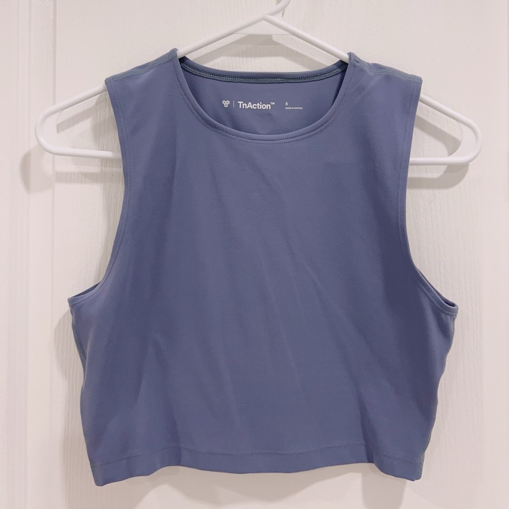 TnAction
TnaBUTTER™ Muscle Hip Tank Umbra Blue color